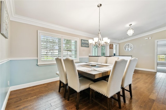 dining space with dark wood-type flooring, plenty of natural light, and crown molding