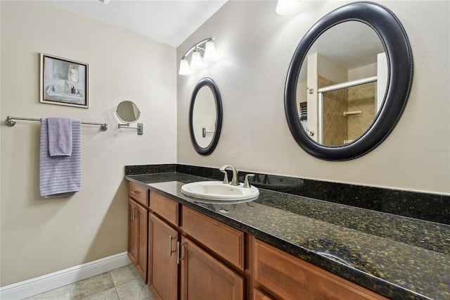 bathroom featuring vanity and tile patterned floors