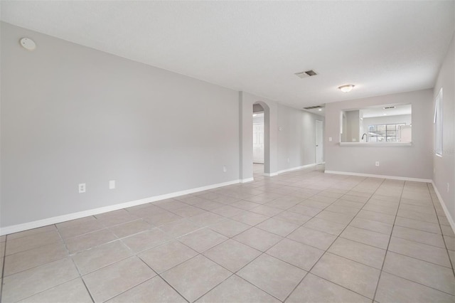 view of tiled spare room