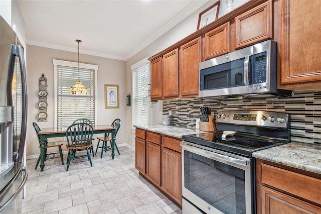 kitchen with tasteful backsplash, crown molding, decorative light fixtures, stainless steel appliances, and light stone countertops