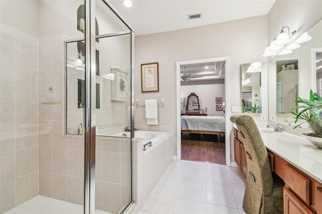 bathroom with vanity, separate shower and tub, and tile patterned floors