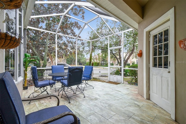 view of patio with a lanai