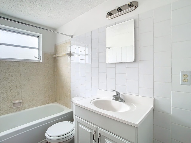 full bathroom with toilet, tasteful backsplash, a textured ceiling, tile walls, and vanity