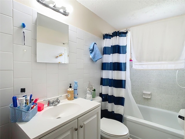 full bathroom with backsplash, a textured ceiling, toilet, vanity, and shower / bathtub combination with curtain