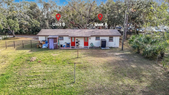 view of front of property with a front lawn