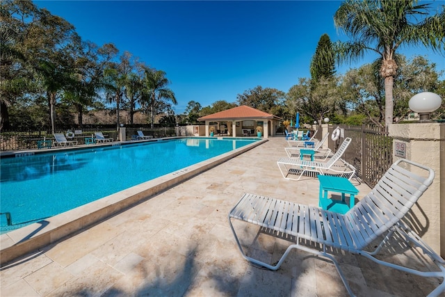 view of swimming pool featuring a patio