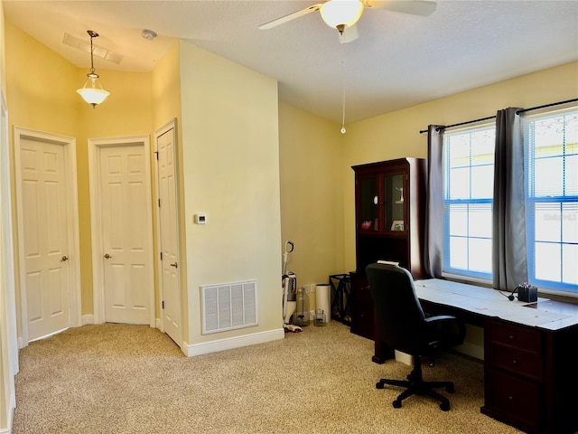 home office with light colored carpet and ceiling fan