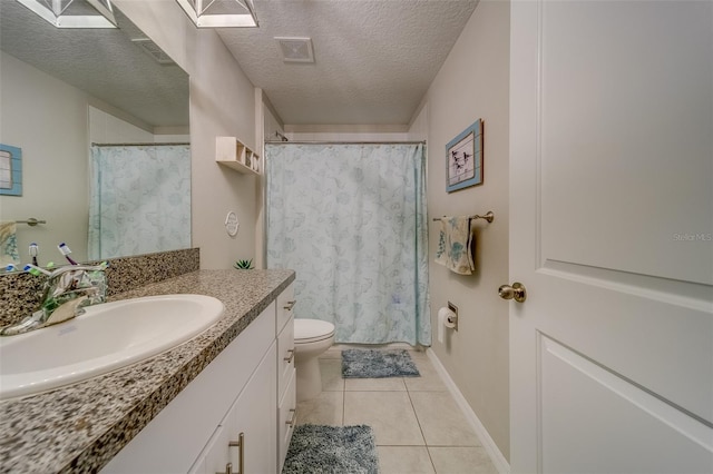 bathroom with toilet, a textured ceiling, tile patterned flooring, a shower with curtain, and vanity