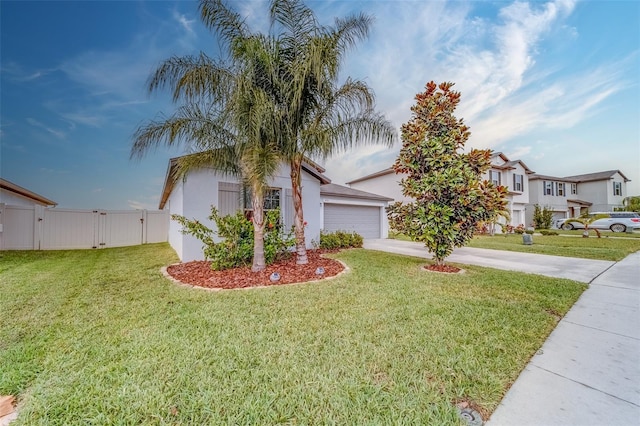 view of front facade with a front lawn and a garage