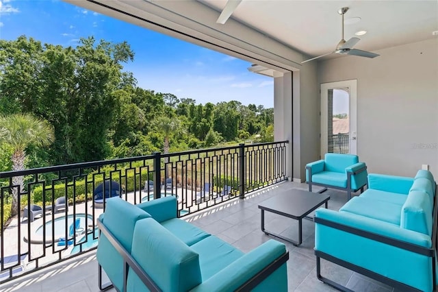 balcony featuring ceiling fan and outdoor lounge area