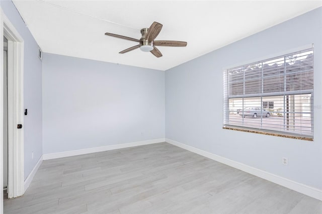 unfurnished room featuring ceiling fan and light hardwood / wood-style flooring