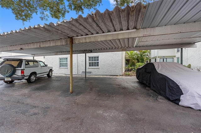 view of parking with a carport