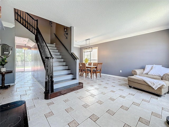 staircase with baseboards, ornamental molding, and a textured ceiling