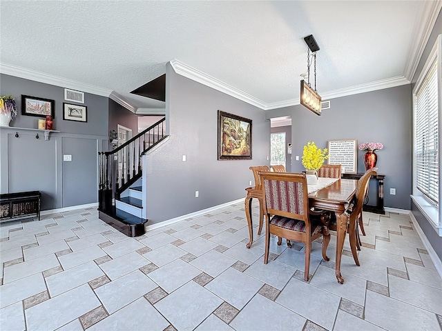 dining room featuring stairs, a textured ceiling, and a wealth of natural light