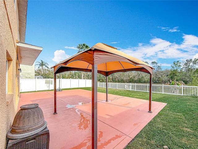 view of patio / terrace featuring a fenced backyard and a gazebo