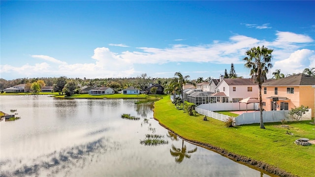 view of water feature featuring a residential view and fence