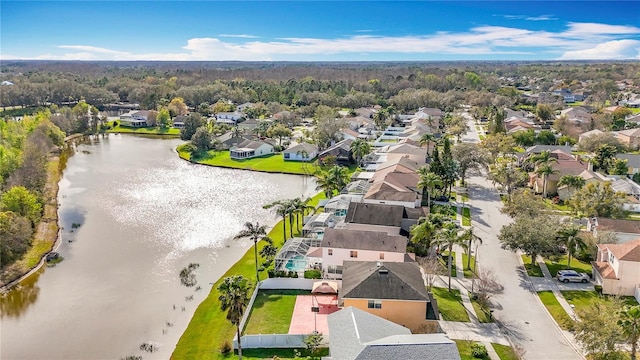 bird's eye view with a water view and a residential view