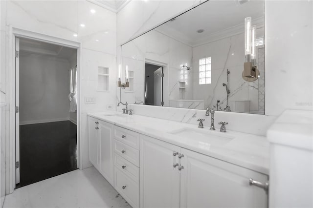 bathroom with vanity and crown molding