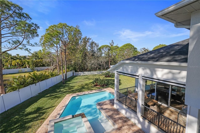 view of pool featuring a yard