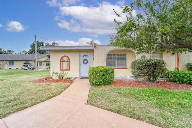 view of front of home with a front yard