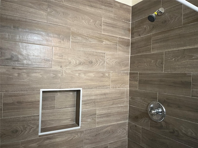 room details with a tile shower