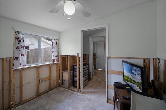 interior space with ceiling fan