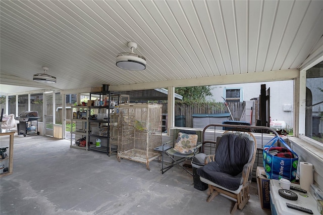 view of patio featuring grilling area, ceiling fan, and a jacuzzi