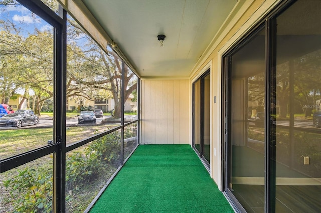 unfurnished sunroom featuring a healthy amount of sunlight