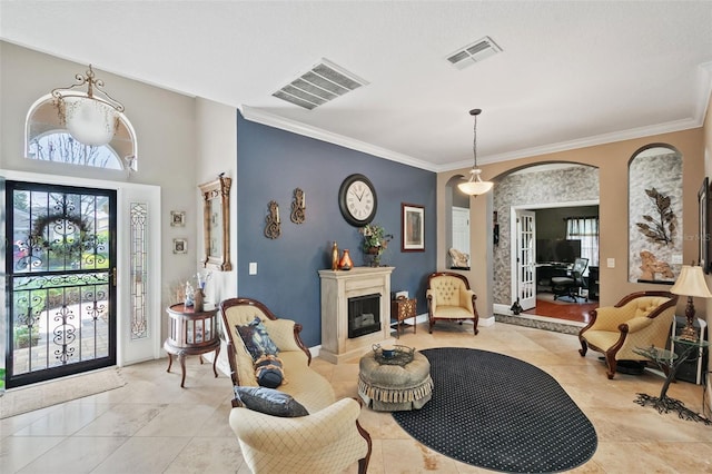 interior space featuring light tile patterned flooring and crown molding