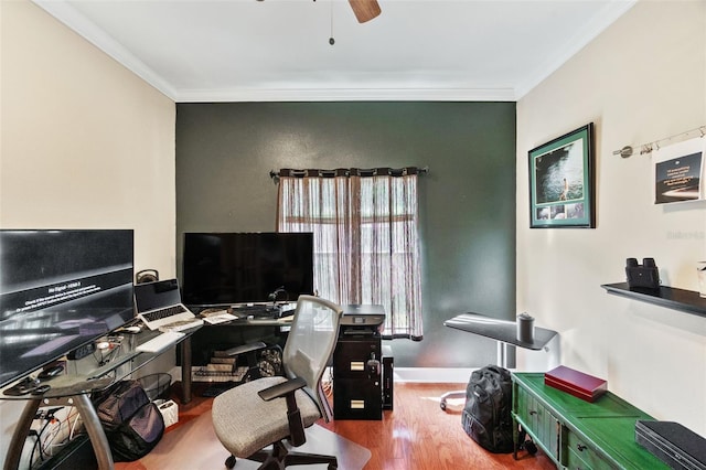 home office featuring ornamental molding, ceiling fan, and hardwood / wood-style floors