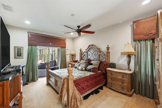 bedroom with ceiling fan, light colored carpet, and access to exterior