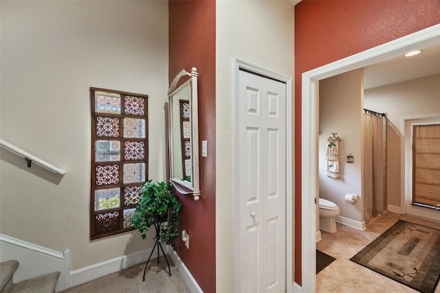 interior space featuring toilet and walk in shower