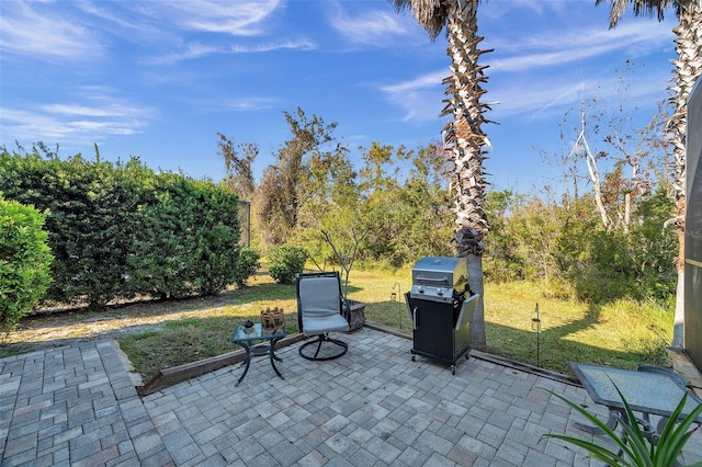 view of patio with a grill