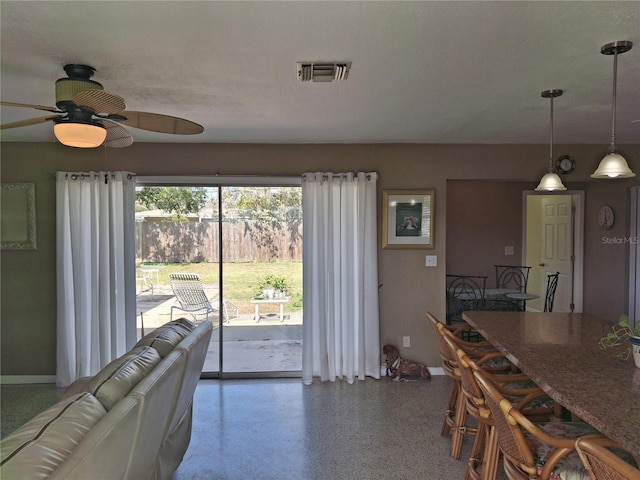 kitchen featuring hanging light fixtures and ceiling fan