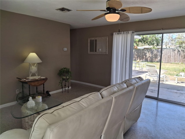 living room featuring ceiling fan