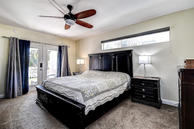 bedroom featuring ceiling fan, access to outside, a textured ceiling, french doors, and dark colored carpet