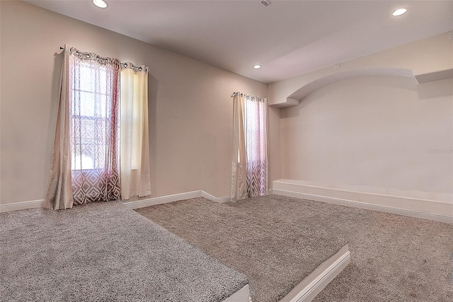 empty room featuring carpet floors