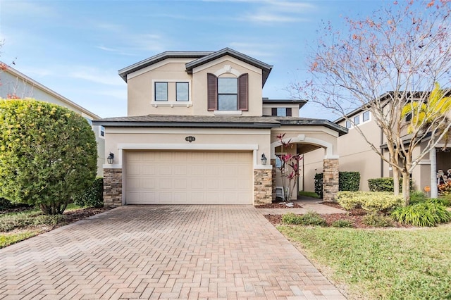 view of front of property featuring a garage