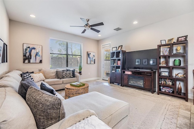 living room with ceiling fan