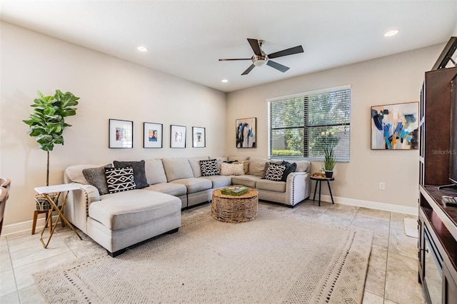 living room with ceiling fan and light tile patterned floors