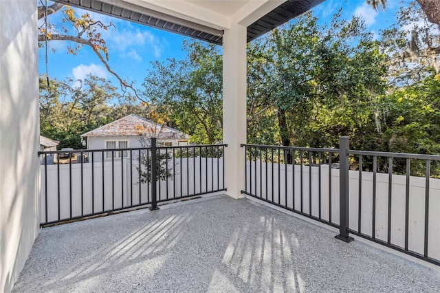 view of patio with a balcony