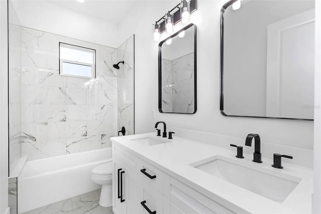 full bathroom with toilet, tiled shower / bath combo, and vanity