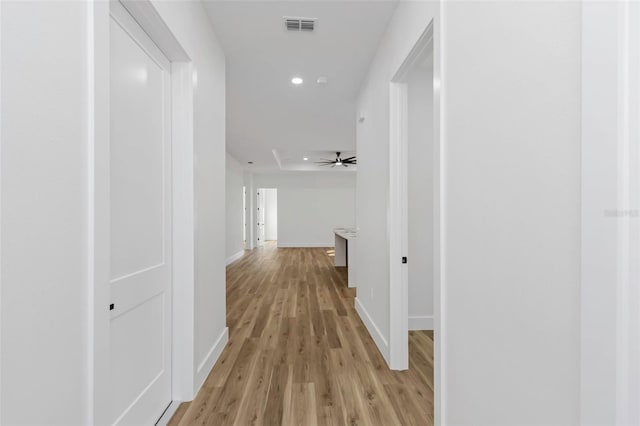 hallway featuring light hardwood / wood-style flooring