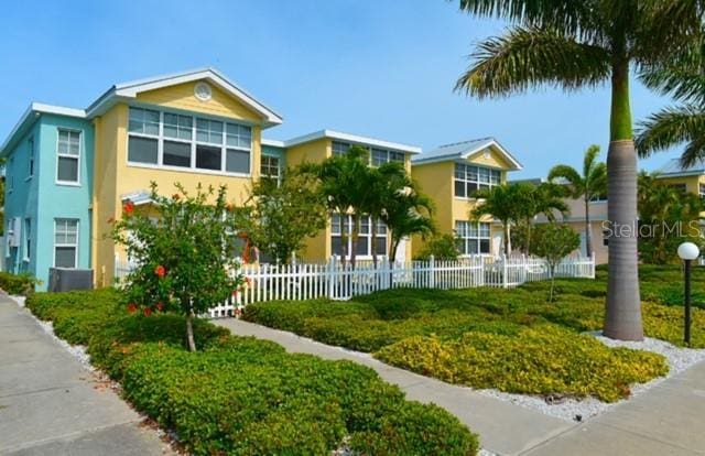 view of property with a fenced front yard