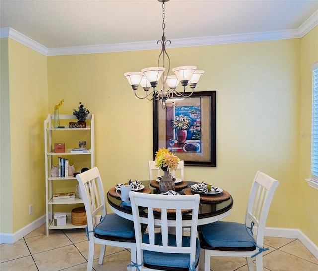 tiled dining area featuring baseboards, crown molding, and a notable chandelier