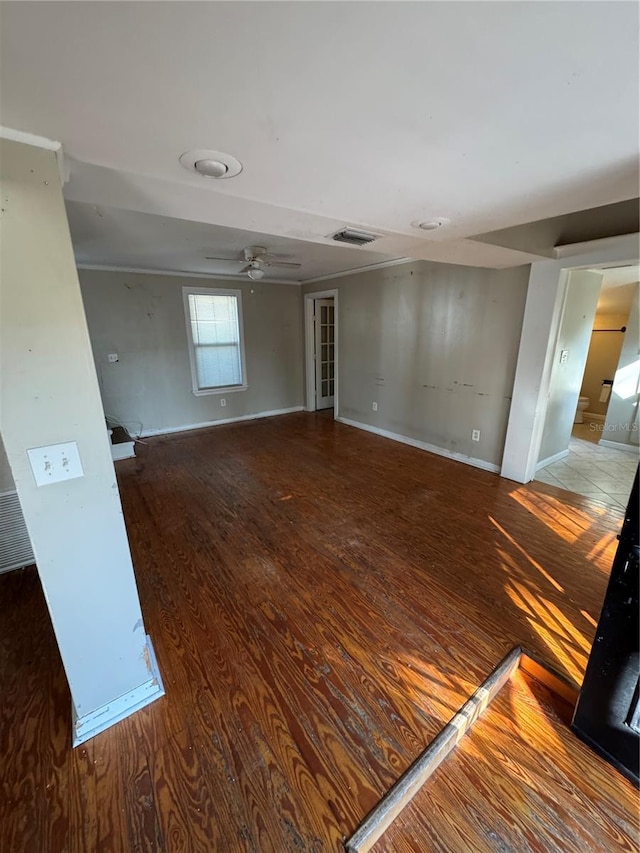 spare room featuring ceiling fan and hardwood / wood-style flooring