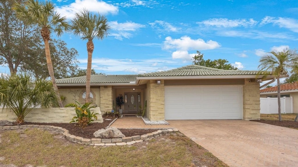 view of front of home with a garage