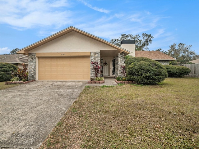 single story home with a front yard and a garage