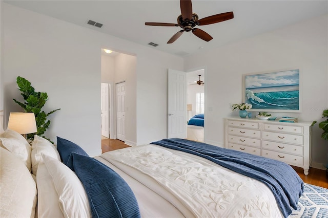 bedroom featuring ceiling fan and hardwood / wood-style flooring