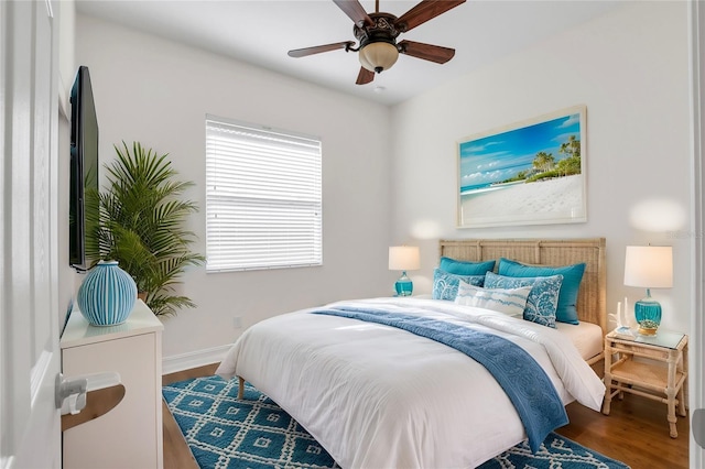 bedroom featuring ceiling fan and wood-type flooring